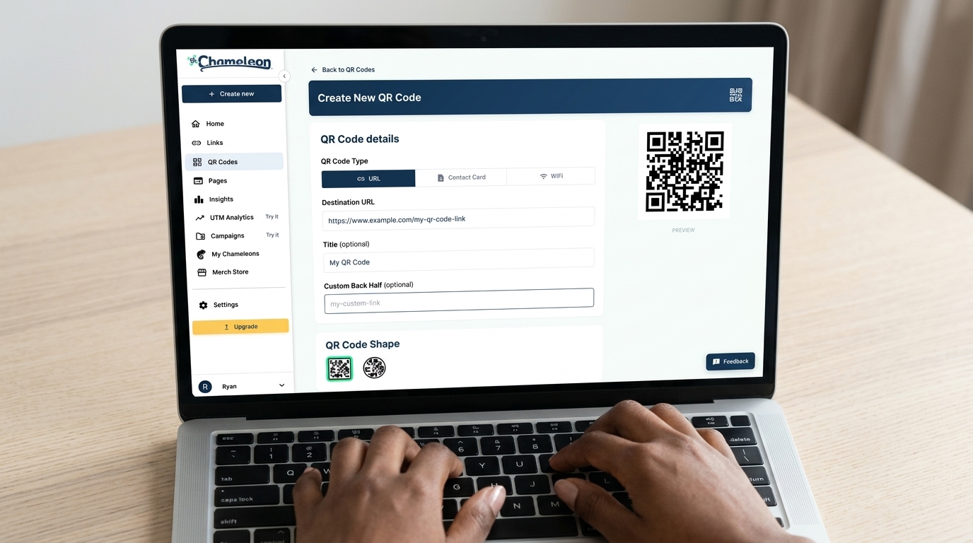 Person at a laptop using the QR Chameleon dashboard to create a QR code for a link, showing the Create New QR Code form and QR code preview on screen